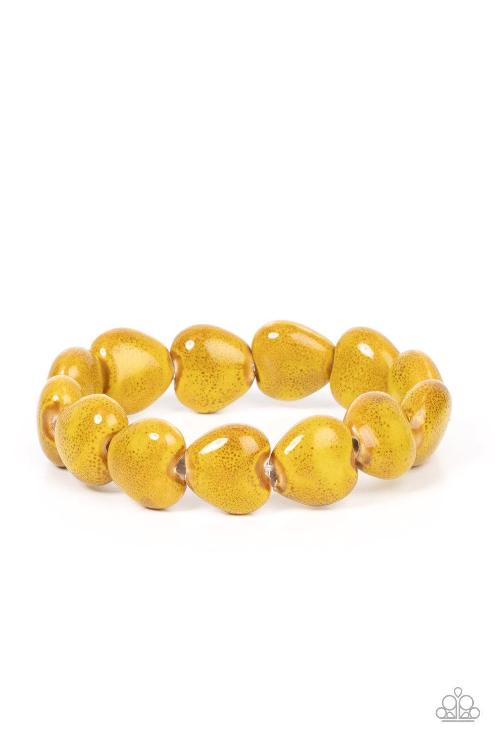 brought-to-you-by-blingflingbykat-glaze-a-trail-yellow-bracelet-paparazzi-accessories-
