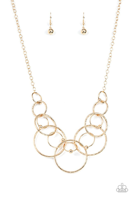brought-to-you-by-blingflingbykat-encircled-in-elegance-gold-necklace-paparazzi-accessories-